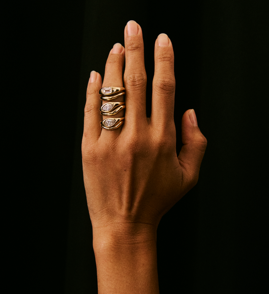 Stacked Kayge rings on a hand